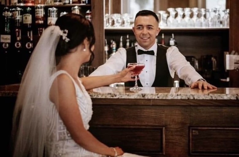 MM Cocktails resident mixologist preparing craft cocktails at Strangford View Mews outdoor BYO bar for hen party guests
